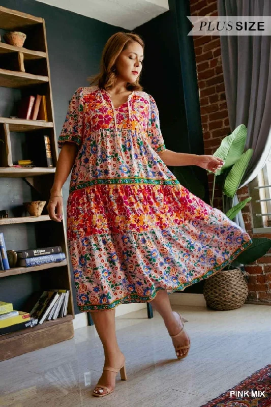 Plus Size Short Sleeve Mixed Floral Print Round Neck Maxi Dress with Split Neck, Neck Tie Detail, Ruffle Trim Neckline, & Smocked Detail on Shoulder Trendy Printed Maxi Dress